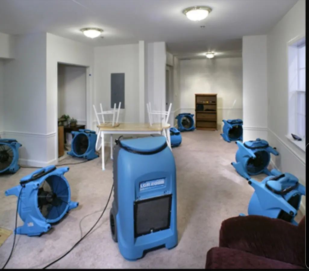 Air movers and dehumidifier setup for Water Extraction & Removal in Syracuse