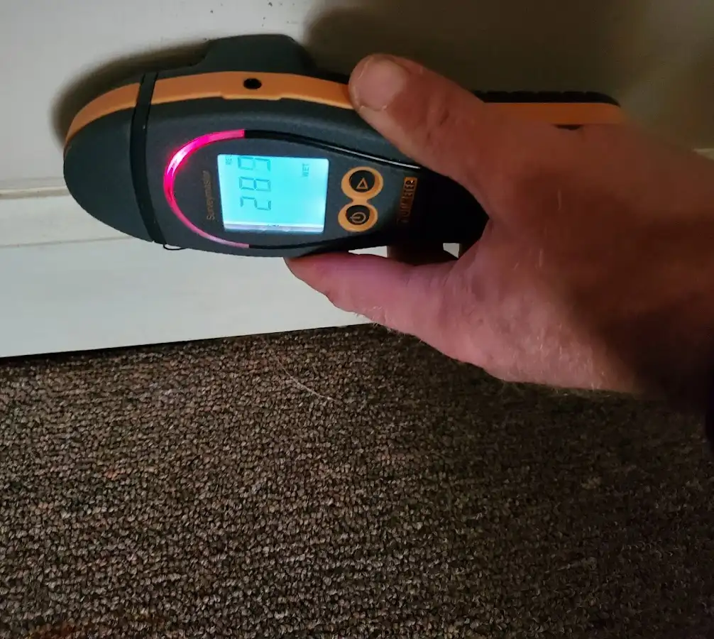 Moisture detection at baseboard during Storm Damage Restoration in Syracuse